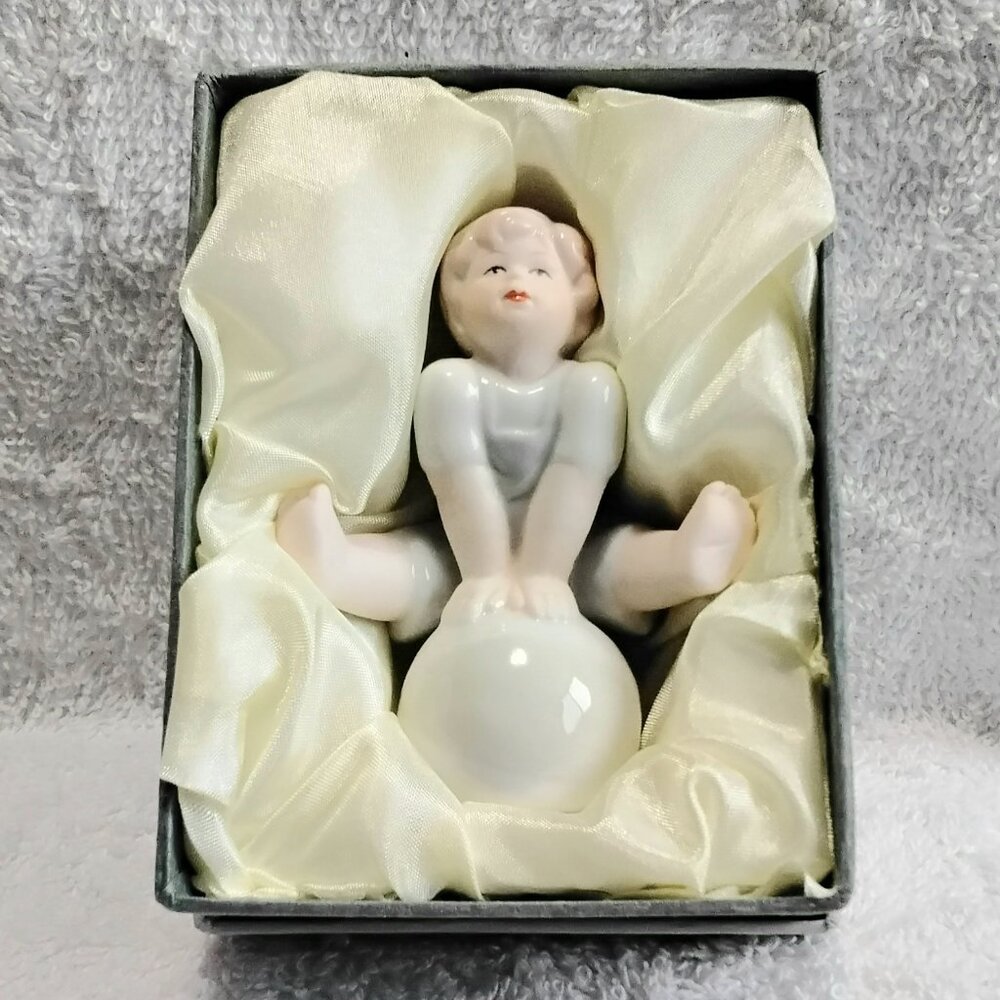 BNIB 3/$20 Boy on Beach Ball Porcelain Figurine Item # HP2021 by Nfinity!!